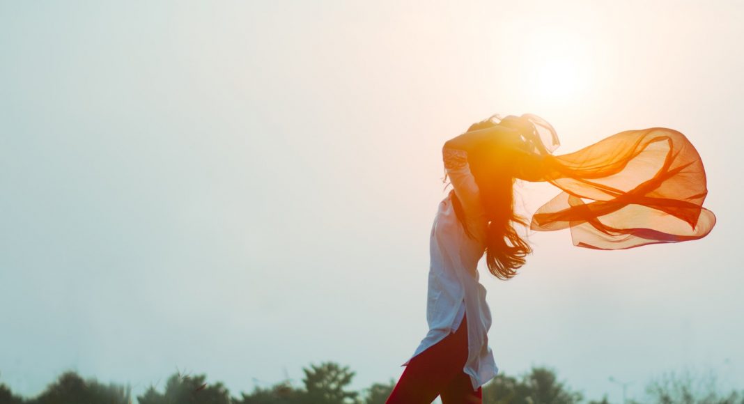 Woman happing outside