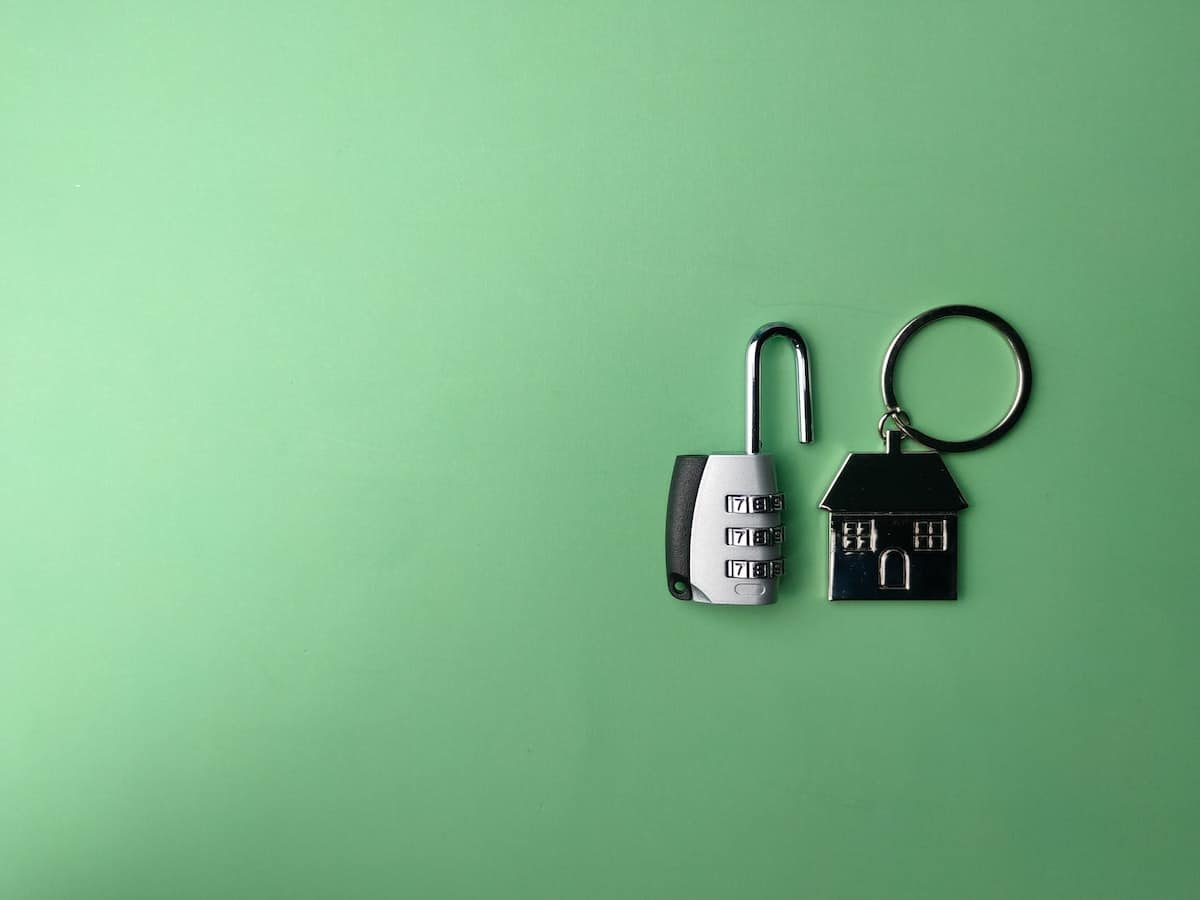 keychain and lock on green table